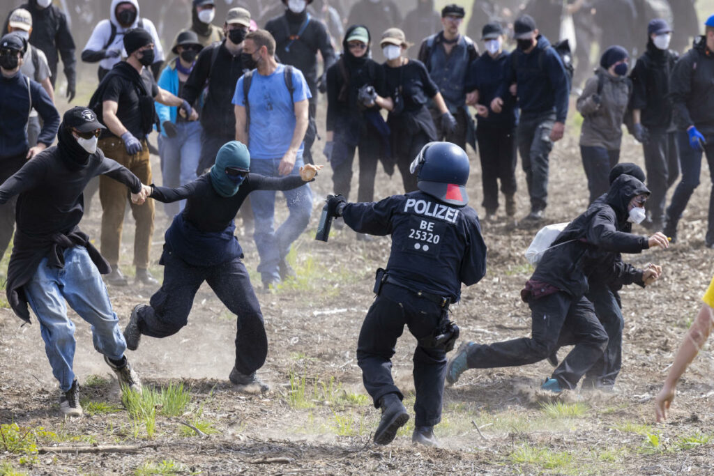 Climate protestors clash with police outside Tesla’s German gigafactory