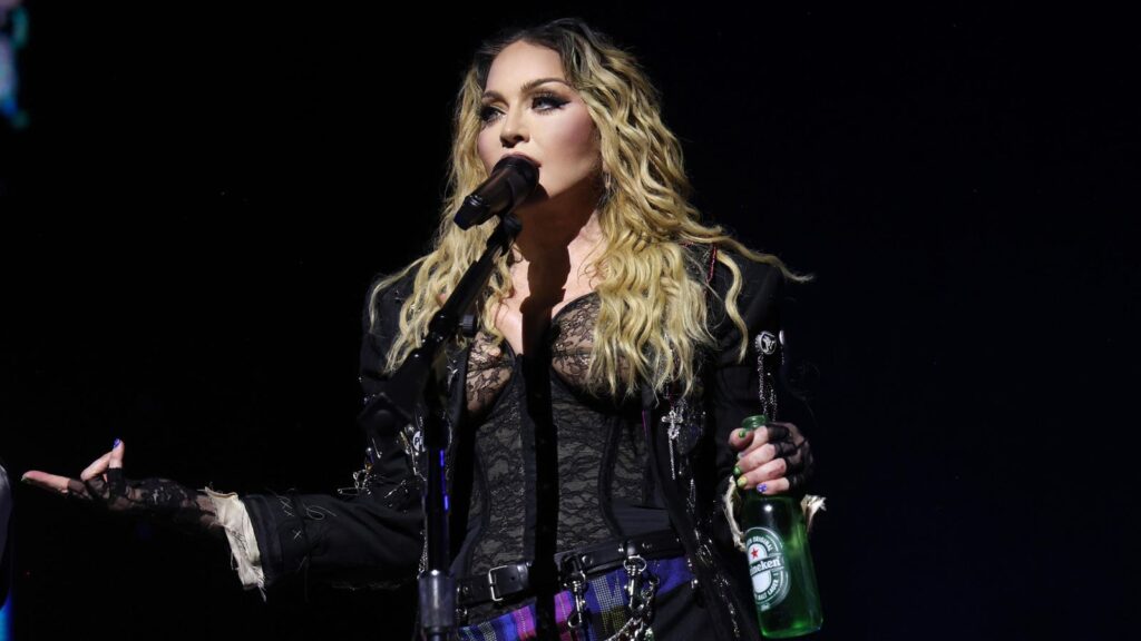 Madonna Sued Again By Fan For Late Concert Start And ‘Topless Women’