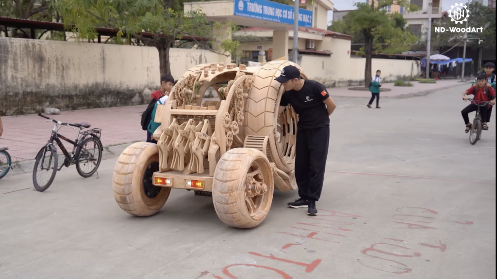 Dad builds a fantastical and functional wooden sci-fi car for kids