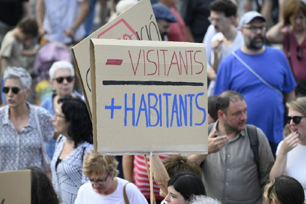 ‘Enough Tourism’: Armed With Water Guns, Barcelona Residents Ask Tourists To ‘Get Out’