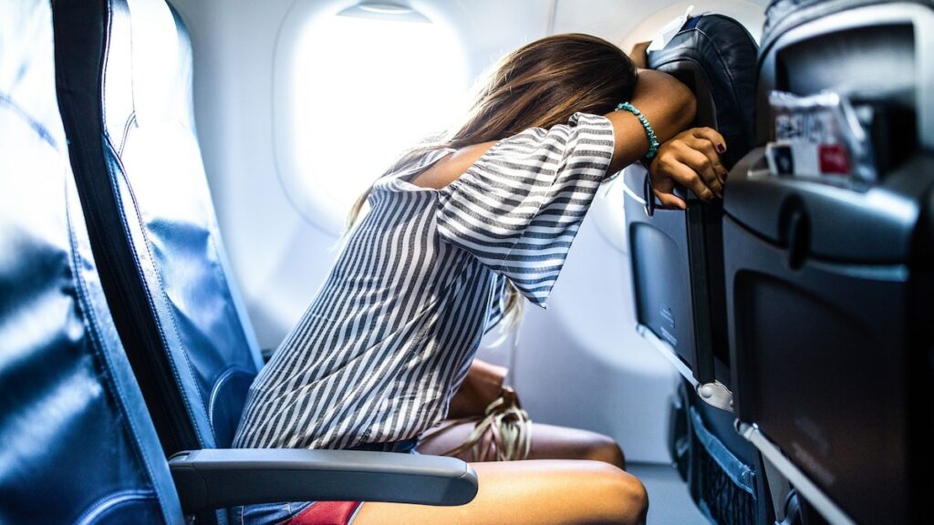 Trouble sleeping on planes? These science-backed tips will help you snooze while flying