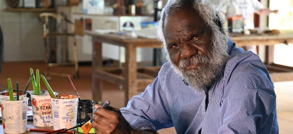 This artist paints at a remote, NDIS-funded art centre. His work is up for a national award