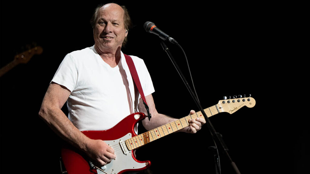 “I was at a King Crimson show, I was signing autographs and somebody handed me Mariah Carey’s record and said, ‘Would you sign this?’” How Adrian Belew ended up on a number one single without even knowing