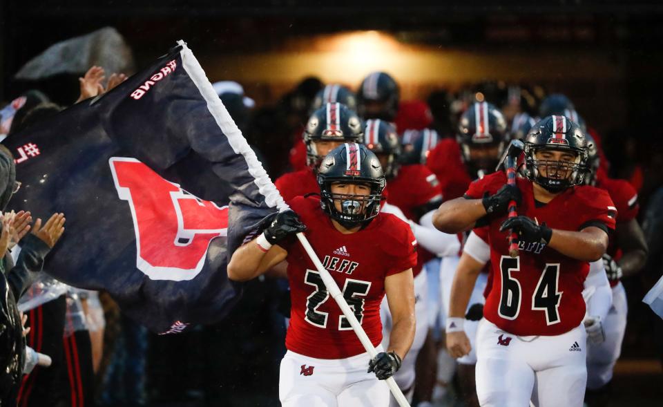 Lafayette Jeff Bronchos take to the field during an ‍IHSAA matchup against Richmond