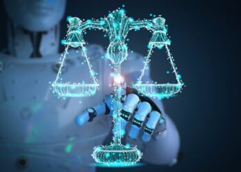 A robot reaches out to touch a digital representation of the justice scales.