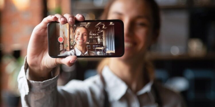 Do yourself, the world and me a big favour: stop phone-filming at gigs | Jason Okundaye – The Guardian