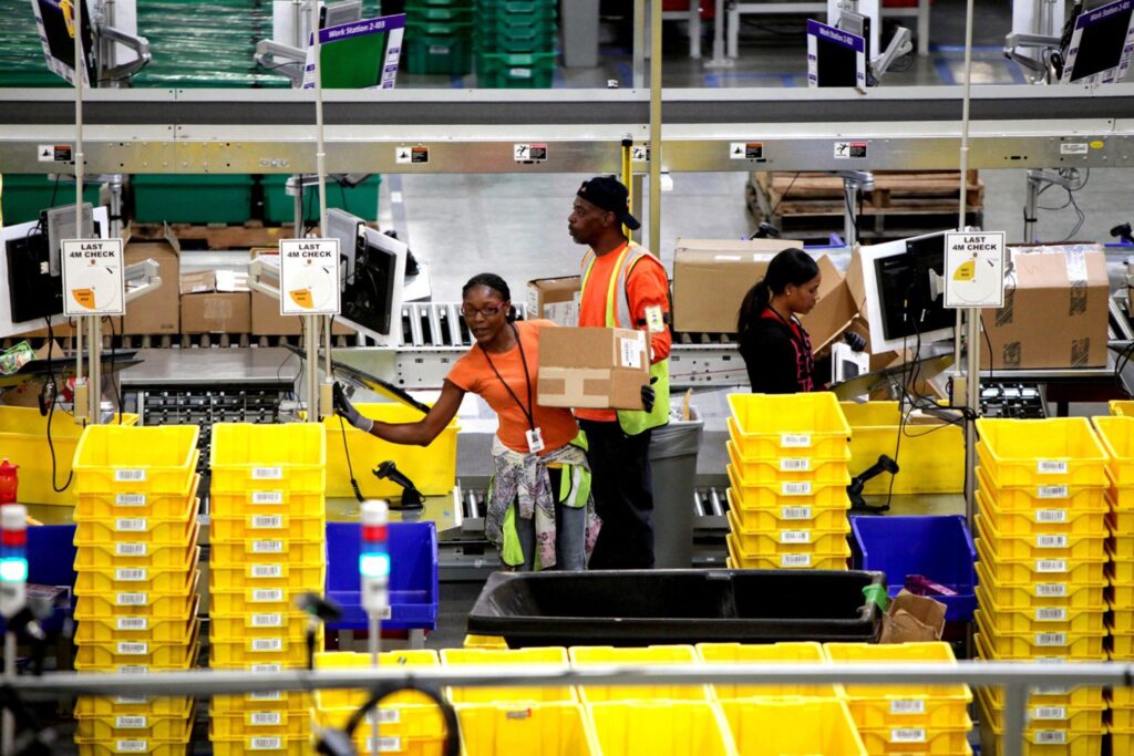Amazon bumps pay, lowers health insurance costs for warehouse workers – Arizona Daily Star