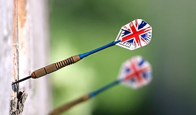 World Darts Championship: Jonny Clayton holds his nerve to reach last-16 – ESPN